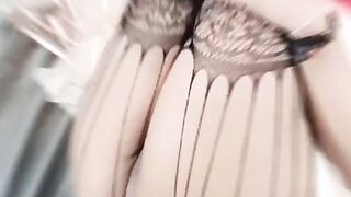 Transvestite whore in a sundress stroking