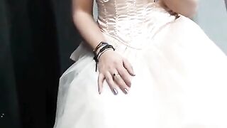Transvestite whore in a sundress stroking