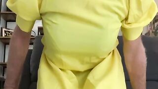 Fatima playing in a yellow dress