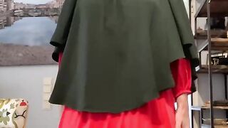Fatima in red dress and green Khimar
