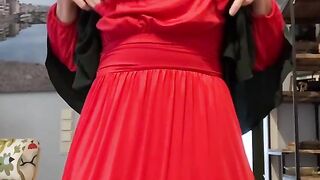 Fatima in red dress and green Khimar