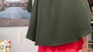 Fatima in red dress and green Khimar