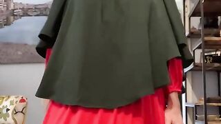 Fatima in red dress and green Khimar