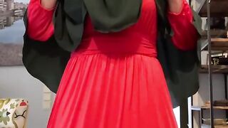 Fatima in red dress and green Khimar