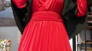 Fatima in red dress and green Khimar