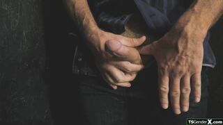 Trans babe is sucking a strangers cock through a gloryhole